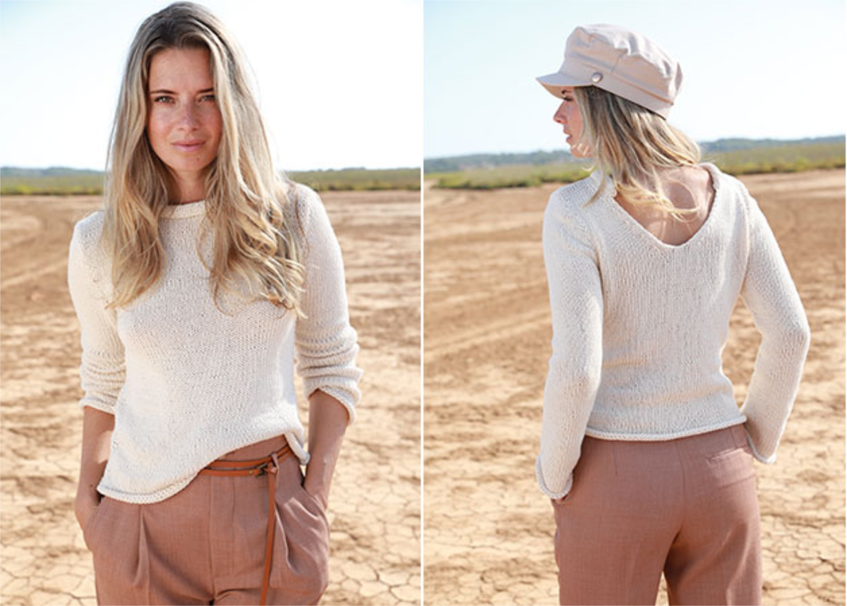 Model in cremefarbenem Sommerpullover mit Rückenausschnitt