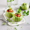 Rezept für gefüllte runde Zucchini mit Feta und Tomaten