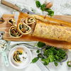 Rezept für veganen Pizzastrudel mit frischen Pilzen und Spinat 