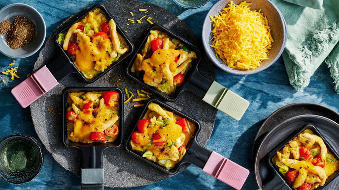 Rezept für Curry-Hähnchen-Raclette mit Tomaten - so wird's würzig an Weihnachten
