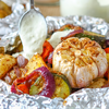 Gemüsepäckchen für den Grill: Mit unserem Rezept werden Zucchini, Tomate & Co. zum Highlight