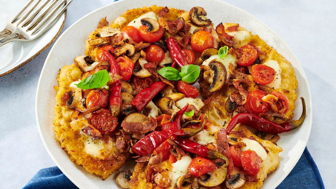 Rezept für Schnitzel-Pizza mit Pilzen & Speck - hier trifft deutsche Küche auf Italien pur!