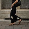 Die perfekte Balance aus lässig und edel: So stylen Sie Flip-Flops mit Absatz richtig