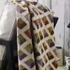 Der trendige Tweedplaid zum Selberstricken