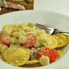 Spargelravioli mit Cherrytomaten und Parmesan