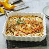 Rezept für Kürbis-Gratin mit Pastinaken, Tomaten und Walnuss-Cumble
